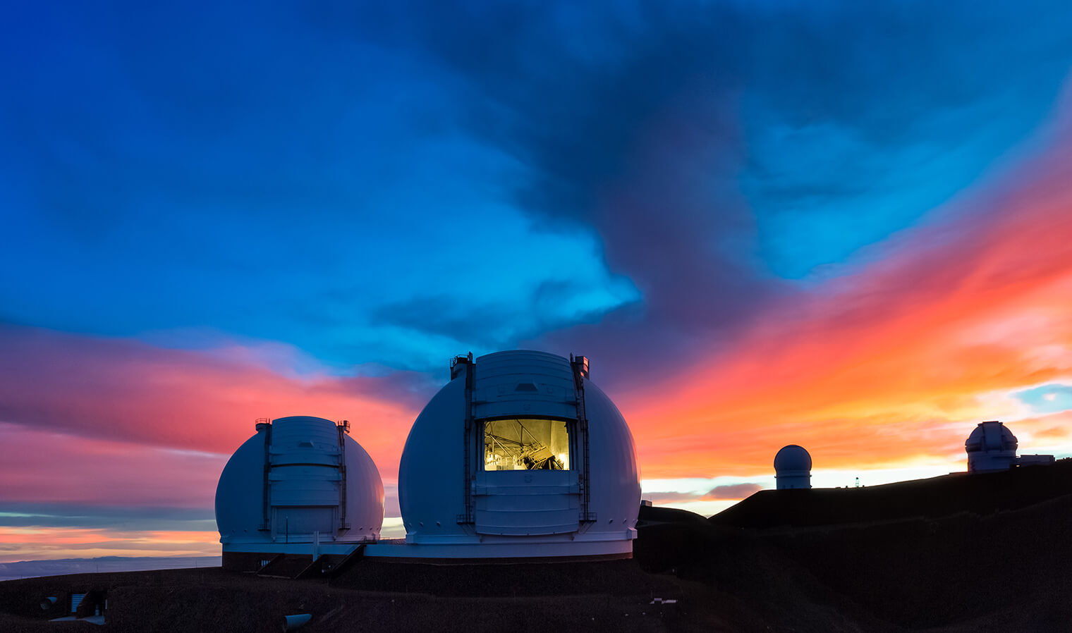 Keck Observatory at sunrise on top of the Maunakea mountain summit in Hawaii