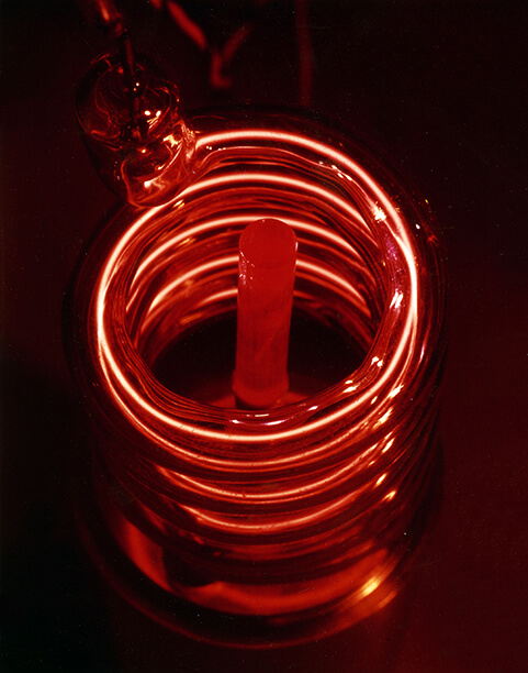 The first laser which is a ruby rod surrounded by a flashlamp